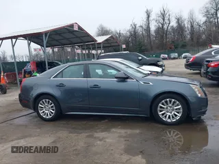 2011 Cadillac CTS Sedan Luxury with VIN 1G6DG5EY7B0163601, listed as a IAAI auction lot 41536256 with 106,523 mi miles. Bid and sale history available at carsss.com. Image 13.