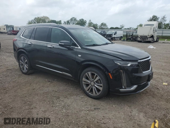 2020 Cadillac XT6 FWD Premium Luxury with VIN 1GYKPCRS8LZ125400, listed as a Copart auction lot 51339095 with 89,973 mi miles and Clean title. Bid and sale history available at DreamBid. Image 4.