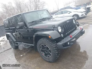 2015 Jeep Wrangler Unlimited Rubicon Hard Rock with VIN 1C4HJWFG9FL569962, listed as a IAAI auction lot 41557801 with 78,597 mi miles. Bid and sale history available at carsss.com. Image 1.