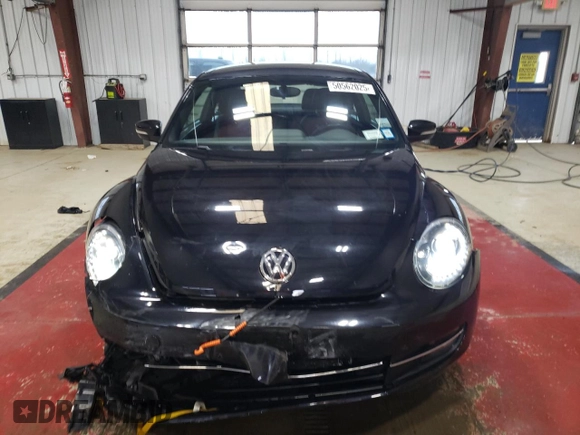 2012 Volkswagen Beetle Turbo with VIN 3VWVA7AT4CM665261, listed as a Copart auction lot 50562025 with 62,570 mi miles and Salvage Title. Bid and sale history available at DreamBid. Image 5.