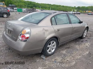 2003 Nissan Altima S with VIN 1N4AL11D33C252059, listed as a IAAI auction lot 42079201 with 152,510 mi miles. Bid and sale history available at carsss.com. Image 4.