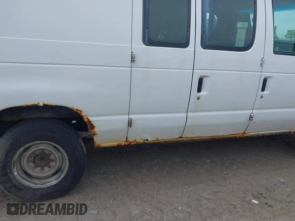 2013 Ford Econoline Cargo Commercial with VIN 1FTNE2EW8DDB33894, listed as a IAAI auction lot 42841415 with 224,026 mi miles and . Bid and sale history available at DreamBid. Image 6.