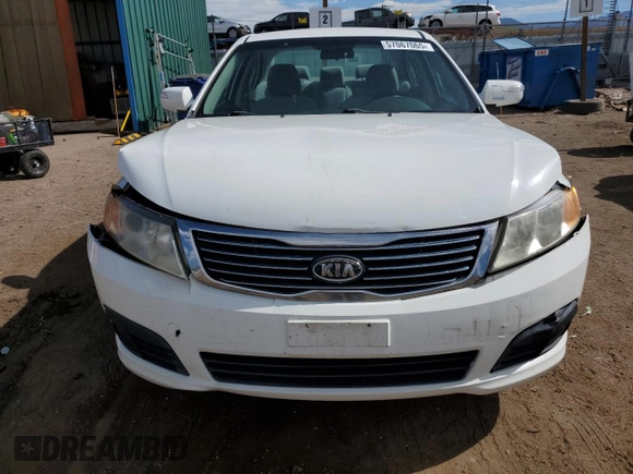 2010 Kia Optima LX z VIN KNAGG4A8XA5382979, wystawiony jako Copart lot #57067065 z przebiegiem 104 611 mil mil oraz Szkoda całkowita • Salvage title. Historia ofert i sprzedaży dostępna na DreamBid. Obrazek 5.