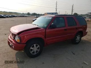 2000 Oldsmobile Bravada z VIN 1GHDT13W6Y2308007, wystawiony jako Copart lot #63862394 z przebiegiem 142 617 mil mil oraz Szkody całkowita. Historia ofert i sprzedaży dostępna na DreamBid. Obrazek 1.