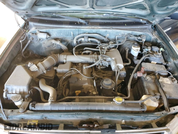 1999 Toyota Tacoma z VIN 4TANL42N6XZ561222, wystawiony jako Copart lot #45721925 z przebiegiem 221 521 mil mil oraz Szkoda całkowita • Salvage title. Historia ofert i sprzedaży dostępna na DreamBid. Obrazek 11.