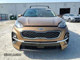 2021 Kia Sportage EX with VIN KNDPN3AC0M7854669, listed as a Copart auction lot 57829275 with 48,520 mi miles and Salvage title. Bid and sale history available at DreamBid. Image 5.