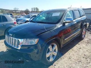 2013 Jeep Grand Cherokee Overland with VIN 1C4RJFCT1DC654653, listed as a IAAI auction lot 41826619 with 124,283 mi miles. Bid and sale history available at carsss.com. Image 20.