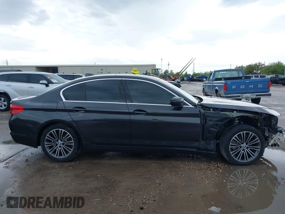 2020 BMW 5 Series 530i with VIN WBAJR3C08LWW77822, listed as a IAAI auction lot 41880376 with 52,533 mi miles and . Bid and sale history available at carsss.com. Image 14.