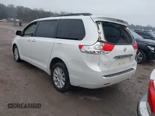 2011 Toyota Sienna XLE with VIN 5TDDK3DC8BS010051, listed as a IAAI auction lot 41405424 with 293,348 mi miles. Bid and sale history available at carsss.com. Image 3.