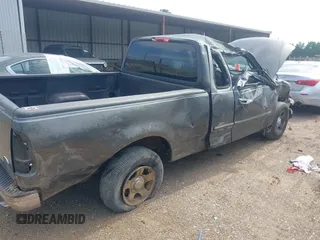 2002 Ford F-150 XL with VIN 1FTRX17W72NA87338, listed as a IAAI auction lot 42583398 with Not provided miles and . Bid and sale history available at DreamBid. Image 6.