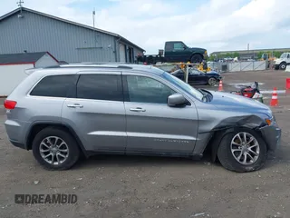 2014 Jeep Grand Cherokee Limited with VIN 1C4RJFBGXEC517832, listed as a IAAI auction lot 42583697 with 107,719 mi miles and . Bid and sale history available at DreamBid. Image 14.