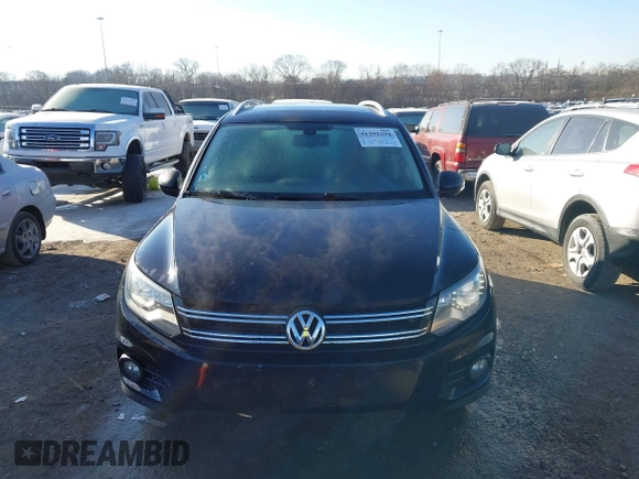 2016 Volkswagen Tiguan S with VIN WVGBV7AX3GW522378, listed as a IAAI auction lot 41391294 with 106,278 mi miles and . Bid and sale history available at DreamBid. Image 6.