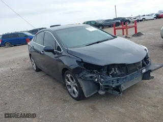 2016 Chevrolet Cruze Premier with VIN 1G1BG5SM1G7250939, listed as a IAAI auction lot 41238704 with 127,872 mi miles. Bid and sale history available at carsss.com. Image 1.