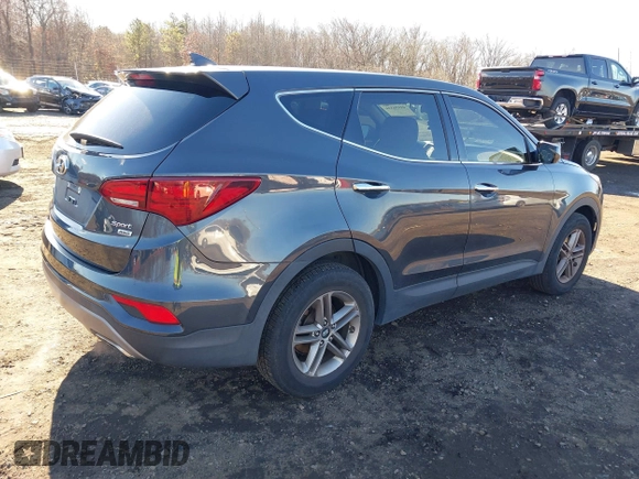 2017 Hyundai Santa Fe 2.4L with VIN 5XYZTDLB0HG453575, listed as a IAAI auction lot 41036334 with 114,031 mi miles and . Bid and sale history available at DreamBid. Image 4.