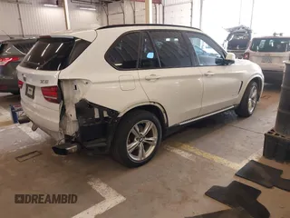 2015 BMW X5 xDrive50i z VIN 5UXKR6C56F0J76986, wystawiony jako IAAI lot #42079106 z przebiegiem 96 220 mil mil oraz . Historia ofert i sprzedaży dostępna na DreamBid. Obrazek 4.