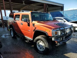 2003 Hummer H2 with VIN 5GRGN23U73H141713, listed as a Copart auction lot 84285624 with 152,719 mi miles and Non Repairable. Bid and sale history available at carsss.com. Image 4.