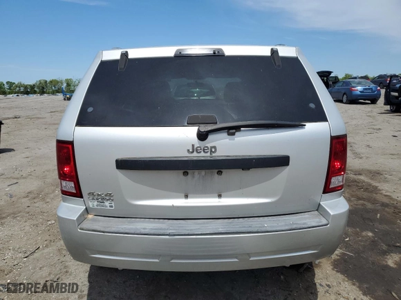 2007 Jeep Grand Cherokee Laredo with VIN 1J8GR48K27C681832, listed as a Copart auction lot 54306725 with 230,673 mi miles and Clean Title. Bid and sale history available at carsss.com. Image 6.
