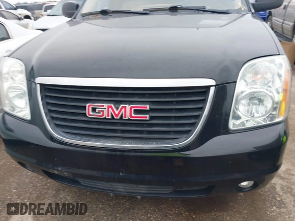 2014 GMC Yukon SLT with VIN 1GKS1CE02ER207447, listed as a IAAI auction lot 41604134 with 199,417 mi miles. Bid and sale history available at carsss.com. Image 6.