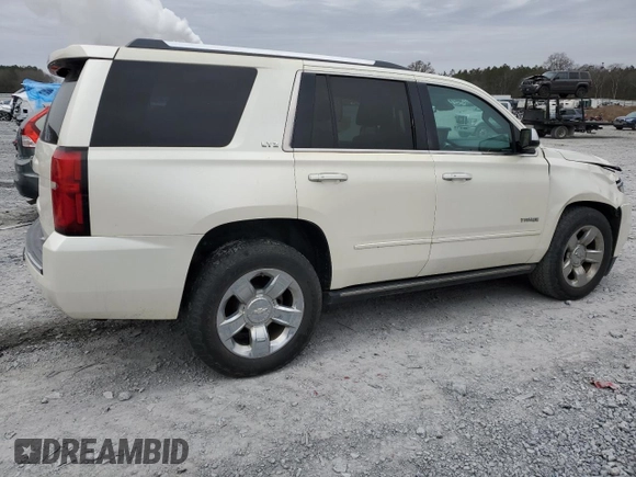 2015 Chevrolet Tahoe LTZ z VIN 1GNSKCKC2FR126674, wystawiony jako Copart lot #42029705 z przebiegiem 187 661 mil mil oraz Nie do naprawy • Non repairable. Historia ofert i sprzedaży dostępna na DreamBid. Obrazek 3.