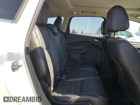 2016 Ford Escape Titanium with VIN 1FMCU9JX5GUC44579, listed as a Copart auction lot 54974965 with 113,776 mi miles and Salvage Title. Bid and sale history available at DreamBid. Image 11.