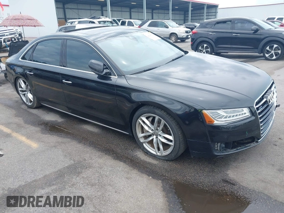 2015 Audi A8 4.0T z VIN WAU32AFD9FN023826, wystawiony jako IAAI lot #42353372 z przebiegiem 94 833 mil mil oraz . Historia ofert i sprzedaży dostępna na DreamBid. Obrazek 1.