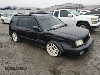 2001 Subaru Forester S w/Premium Pkg with VIN JF1SF65611H730807, listed as a Copart auction lot 84241384 with 221,698 mi miles and Salvage Title. Bid and sale history available at carsss.com. Image 4.