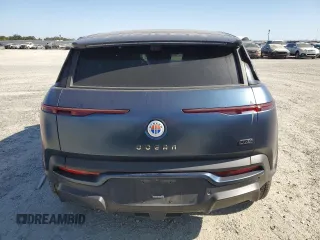 2023 Fisker Ocean One с VIN VCF1ZBU28PG002582, выставлен на аукционе Copart как лот 63515715 с пробегом 304 миль миль и Списание • Salvage title. История ставок и продаж доступна на DreamBid. Изображение 6.