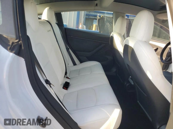 2022 Tesla Model 3 Long Range with VIN 5YJ3E1EB2NF199141, listed as a Copart auction lot 53069145 with 67,140 mi miles and Non Repairable. Bid and sale history available at DreamBid. Image 10.