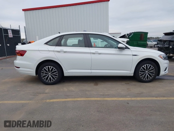 2019 Volkswagen Jetta SEL z VIN 3VWE57BU4KM248989, wystawiony jako IAAI lot #41465186 z przebiegiem 41 985 mil mil oraz . Historia ofert i sprzedaży dostępna na DreamBid. Obrazek 13.