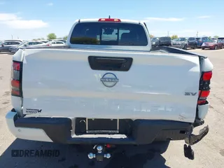 2022 Nissan Frontier S z VIN 1N6ED1CLXNN695990, wystawiony jako IAAI lot #42114263 z przebiegiem 14 773 mil mil oraz . Historia ofert i sprzedaży dostępna na DreamBid. Obrazek 16.