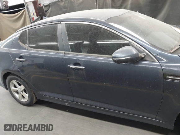 2015 Kia Optima LX z VIN KNAGM4A78F5594402, wystawiony jako IAAI lot #42232732 z przebiegiem 83 363 mil mil oraz . Historia ofert i sprzedaży dostępna na DreamBid. Obrazek 13.