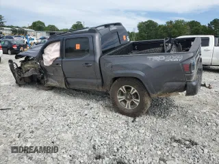 2017 Toyota Tacoma SR5 with VIN 5TFCZ5AN6HX083463, listed as a Copart auction lot 61348895 with 102,927 mi miles and Salvage title. Bid and sale history available at DreamBid. Image 2.