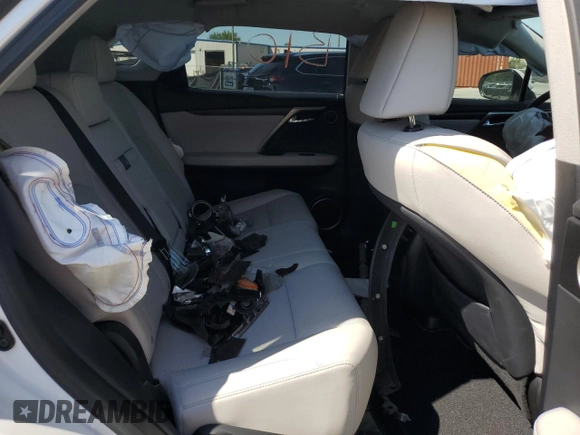 2020 Lexus RX with VIN 2T2HGMDA2LC050011, listed as a Copart auction lot 50695395 with 75,567 mi miles and Salvage Title. Bid and sale history available at carsss.com. Image 11.