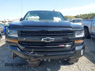 2017 Chevrolet Silverado 1500 LT with VIN 3GCUKREC4HG310842, listed as a IAAI auction lot 41908001 with 179,814 mi miles and . Bid and sale history available at DreamBid. Image 13.