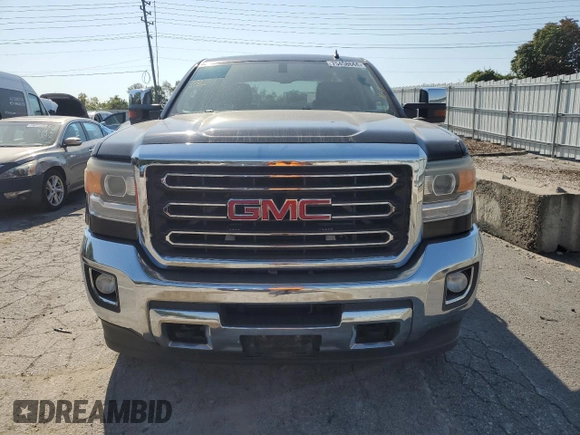 2015 GMC Sierra 2500HD SLT with VIN 1GT12ZEG4FF160722, listed as a Copart auction lot 75458644 with 337,580 mi miles and Salvage title. Bid and sale history available at DreamBid. Image 5.