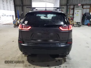 2021 Jeep Cherokee 80th Anniversary with VIN 1C4PJMMX7MD220289, listed as a Copart auction lot 51662175 with 77,109 mi miles and Salvage Title. Bid and sale history available at carsss.com. Image 6.