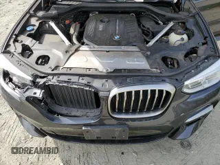 2019 BMW X4 M40i with VIN 5UXUJ5C5XKLJ64004, listed as a Copart auction lot 52106895 with 74,599 mi miles and Salvage title. Bid and sale history available at DreamBid. Image 14.