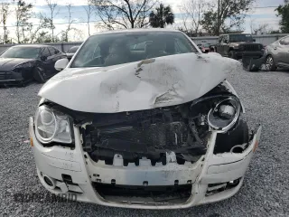 2008 Volkswagen Eos Turbo z VIN WVWBA71F88V039175, wystawiony jako Copart lot #88579725 z przebiegiem 89 414 mil mil oraz Szkoda całkowita • Salvage title. Historia ofert i sprzedaży dostępna na DreamBid. Obrazek 5.