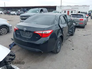2015 Toyota Corolla L with VIN 5YFBURHE1FP212289, listed as a IAAI auction lot 42029067 with 147,377 mi miles and . Bid and sale history available at DreamBid. Image 4.