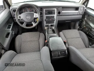 2010 Jeep Commander Sport with VIN 1J4RG4GK2AC121821, listed as a Copart auction lot 57793545 with 171,405 mi miles and Salvage title. Bid and sale history available at DreamBid. Image 8.