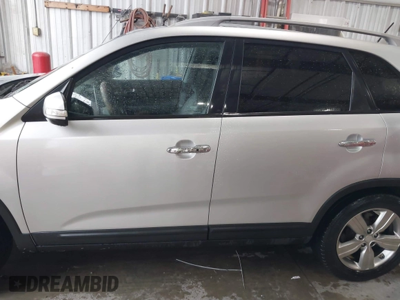 2013 Kia Sorento EX with VIN 5XYKU4A20DG313084, listed as a IAAI auction lot 41976552 with 168,397 mi miles and . Bid and sale history available at carsss.com. Image 15.