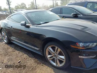 2019 Ford Mustang EcoBoost with VIN 1FA6P8TH0K5163443, listed as a IAAI auction lot 42452617 with 87,833 mi miles and . Bid and sale history available at DreamBid. Image 12.