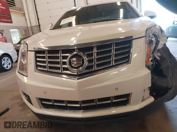 2013 Cadillac SRX Premium Collection с VIN 3GYFNEE33DS574080, выставлен на аукционе IAAI как лот 42166048 с пробегом 109 393 миль миль и . История ставок и продаж доступна на DreamBid. Изображение 13.