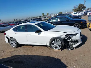 2021 Acura TLX Technology z VIN 19UUB5F48MA002731, wystawiony jako IAAI lot #41820962 z przebiegiem 30 747 mil mil oraz . Historia ofert i sprzedaży dostępna na DreamBid. Obrazek 13.