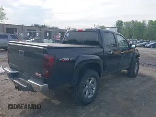 2010 GMC Canyon SLE1 z VIN 1GTJTCDEXA8109443, wystawiony jako IAAI lot #42240716 z przebiegiem 160 500 mil mil oraz . Historia ofert i sprzedaży dostępna na DreamBid. Obrazek 4.