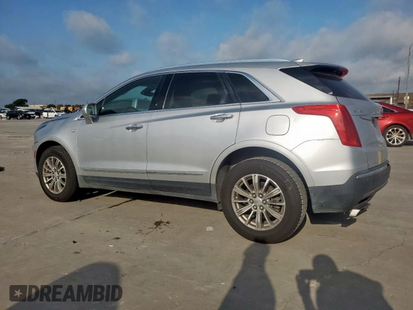 2018 Cadillac XT5 Luxury FWD with VIN 1GYKNCRS2JZ208016, listed as a Copart auction lot 61551285 with 145,019 mi miles and Salvage title. Bid and sale history available at DreamBid. Image 2.