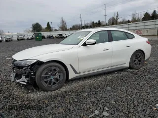2023 BMW i4 eDrive40 with VIN WBY73AW01PFP77943, listed as a Copart auction lot 39385944 with 8,390 mi miles. Bid and sale history available at carsss.com. Image 1.