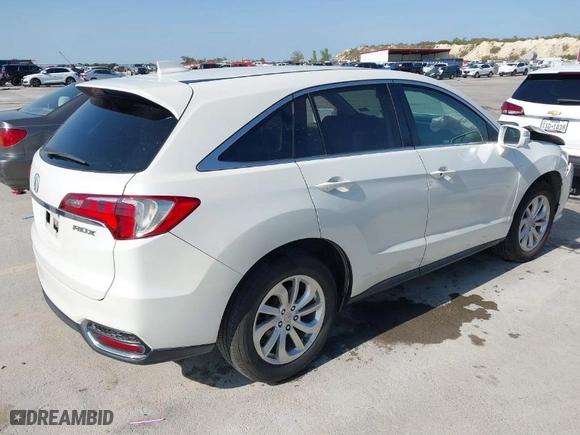 2016 Acura RDX with VIN 5J8TB3H31GL007735, listed as a IAAI auction lot 41933958 with 199,940 mi miles. Bid and sale history available at carsss.com. Image 4.