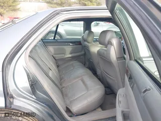 2003 Cadillac Seville Luxury SLS with VIN 1G6KS54Y63U167768, listed as a IAAI auction lot 41699674 with 112,755 mi miles. Bid and sale history available at carsss.com. Image 8.