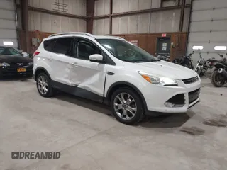 2016 Ford Escape Titanium with VIN 1FMCU9J95GUB02377, listed as a IAAI auction lot 41869557 with 88,441 mi miles. Bid and sale history available at carsss.com. Image 1.